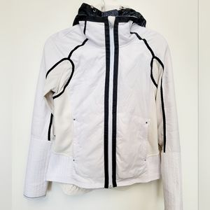 Lululemon cream jacket with removable black lace hooded insert.